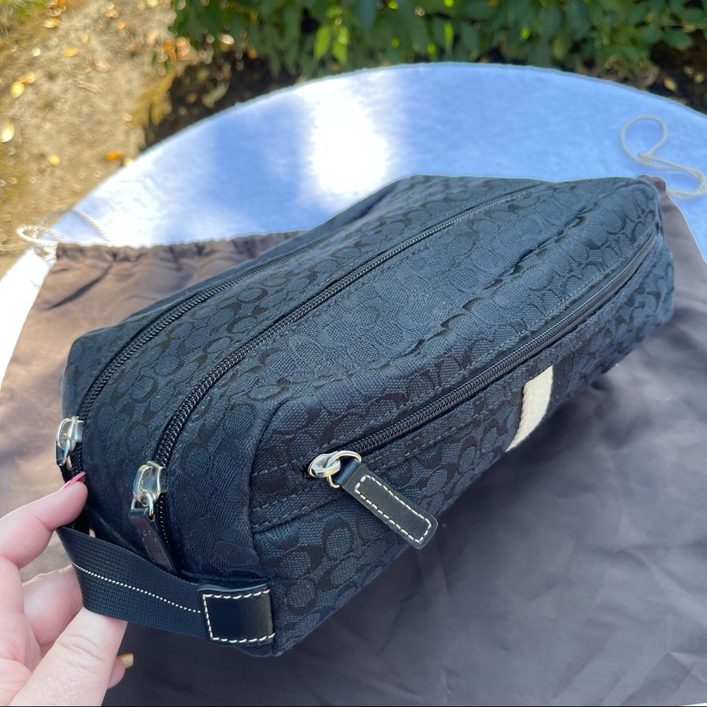 Coach Signature “C” Toiletry Bag